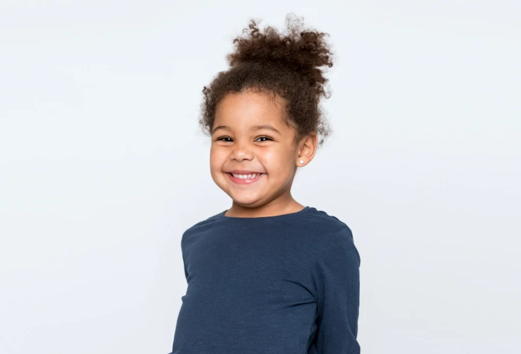 Child Smiling After Dental Visit