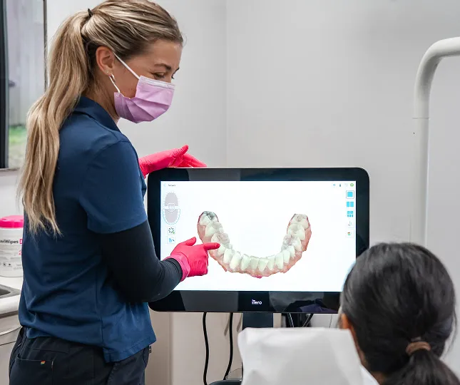 Dentist Using An iTero Digital Scanner On A Patient
