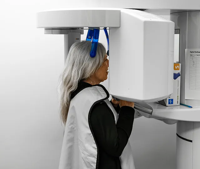 Panoramic X-Ray Machine Scanning A Patient